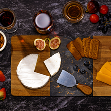 Lade das Bild in den Galerie-Viewer, Servierbrett "Limpopo" aus schwarz-orangenem Marmor und Akazienholz 40 cm | 1er Set