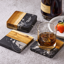 Lade das Bild in den Galerie-Viewer, Untersetzer "Thasos" aus schwarzem Marmor & Akazienholz 9 cm | 4er Set