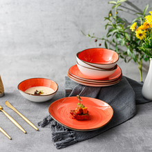 Lade das Bild in den Galerie-Viewer, Keramik Tellerset „Papaya Creme“ – gestapelte Teller und Schüsseln – Seitenansicht