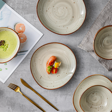 Lade das Bild in den Galerie-Viewer, Frühstücksteller Ø 21 cm aus Keramik – Potosi Creme, mit Speisen dekoriert